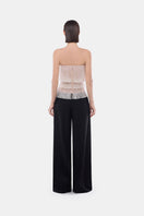 White crystal fringe tube top by Montsand, featuring a stylish design with sparkling crystal accents and a fitted sleeveless cut.
