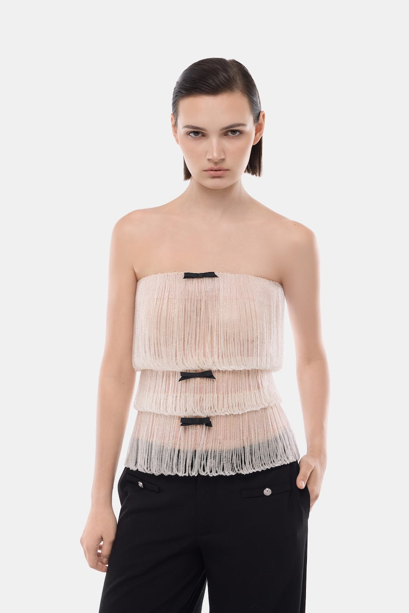 White crystal fringe tube top by Montsand, featuring shimmering fringe detailing and fitted style, perfect for trendy summer outfits.