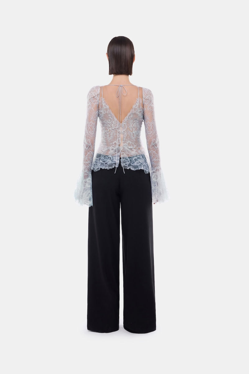 Blue floral cami top by Montsand, featuring lightweight fabric and spaghetti straps, displayed on a neutral background.