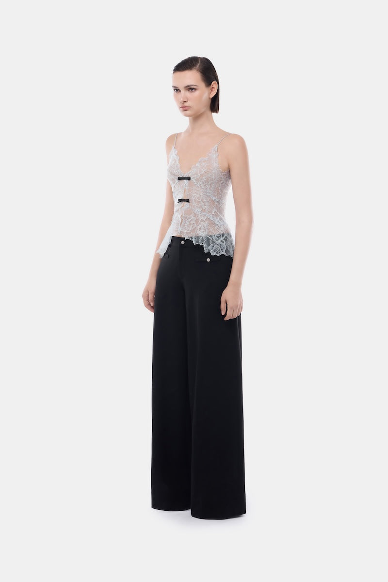 Blue floral cami top by Montsand featuring a lightweight fabric with a delicate floral pattern and adjustable straps.