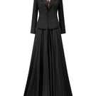 Black TAFFETA MIKADO peplum gown by Tracy Studio, featuring a fitted bodice and elegant peplum detail, perfect for formal occasions.