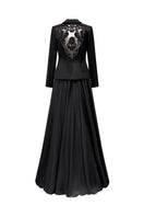 Black taffeta mikado peplum gown by Tracy Studio, featuring a fitted bodice and elegant peplum detail.