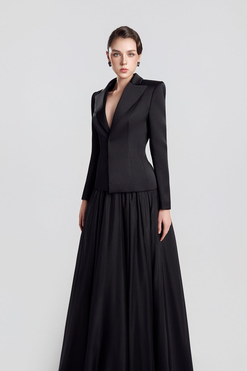 Black TAFFETA MIKADO PEPLUM Maxi Dress by Tracy Studio, showcasing a flowing design with elegant peplum detail.