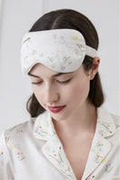 Soft pink silk eye mask from MANITO's Princess Louise collection, designed for comfortable sleep and relaxation.