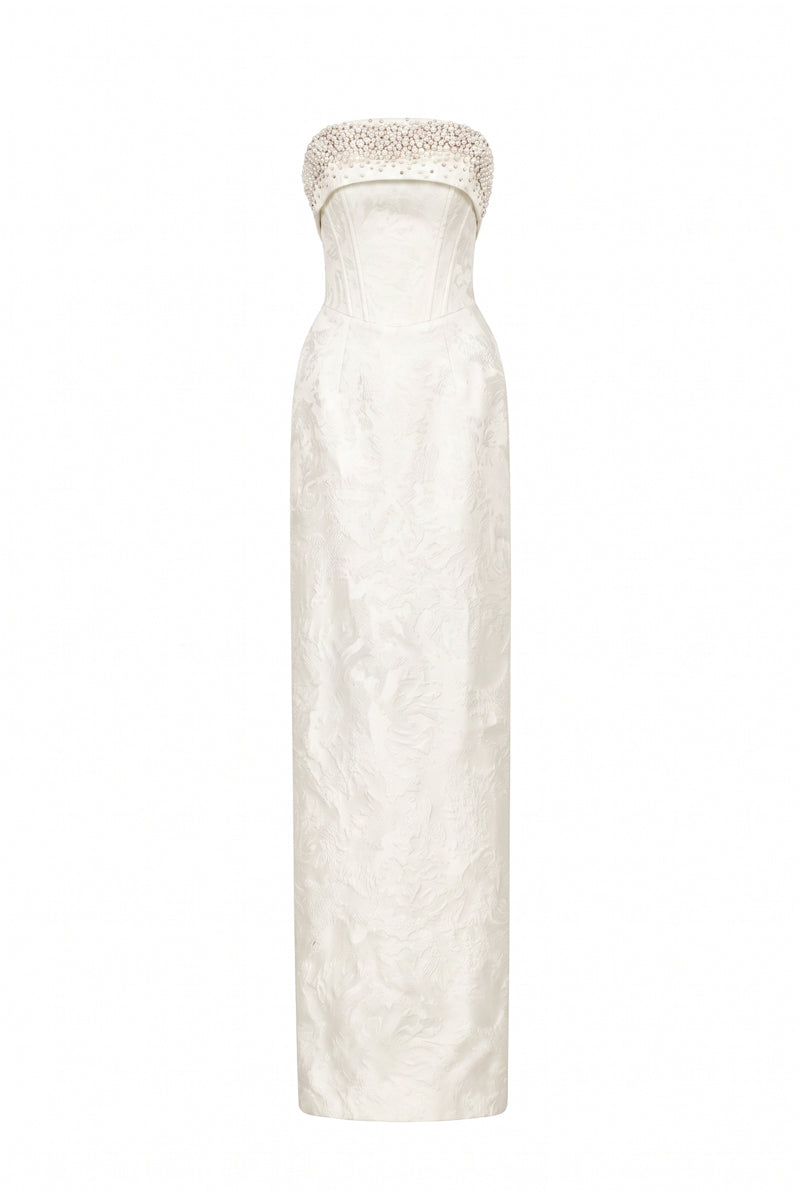 White strapless ballgown in rose design brocade by I.H.F, featuring elegant fabric and flowing silhouette.
