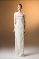 White strapless ballgown in rose design brocade by I.H.F, featuring elegant fabric and a flowing silhouette.