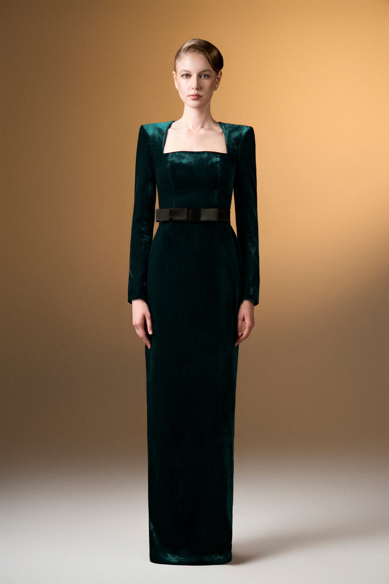 Green grain velvet trapeze neck gown with long sleeves by I.H.F, featuring a flowing silhouette and elegant design.