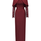 Dark red I.H.F gown with round neck, long sleeves, and a mini cape, showcasing a sleek, elegant design.