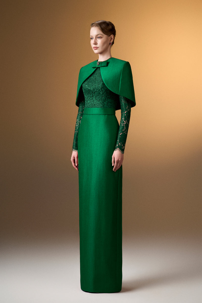 Green I.H.F gown with round neck, long sleeves, and a mini cape, featuring a sleek and elegant column silhouette.