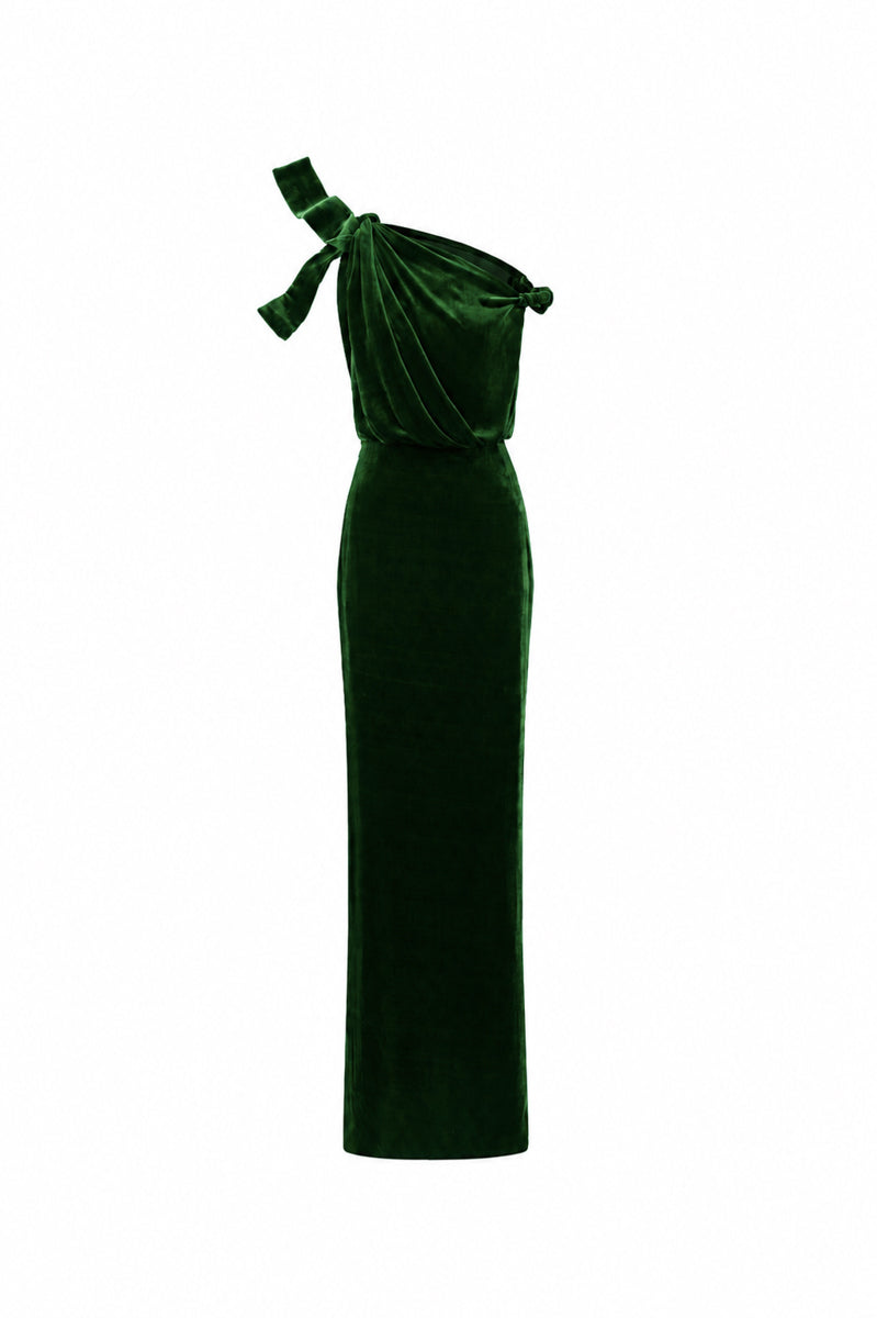 Dark green I.H.F velvet one-shoulder gown with asymmetric design and flowing drape, styled as a sleek column dress.