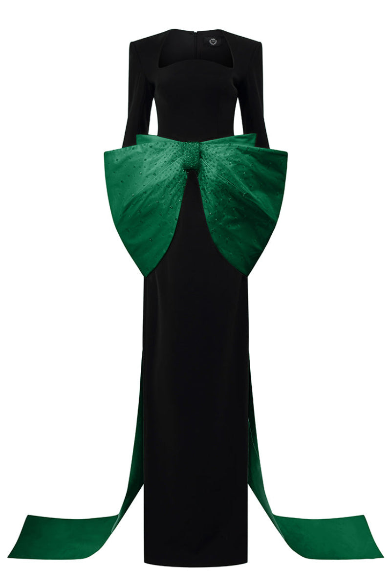 Elegant green Loreli crepe and taffeta gown by I.H.F featuring a flowing silhouette and intricate detailing.