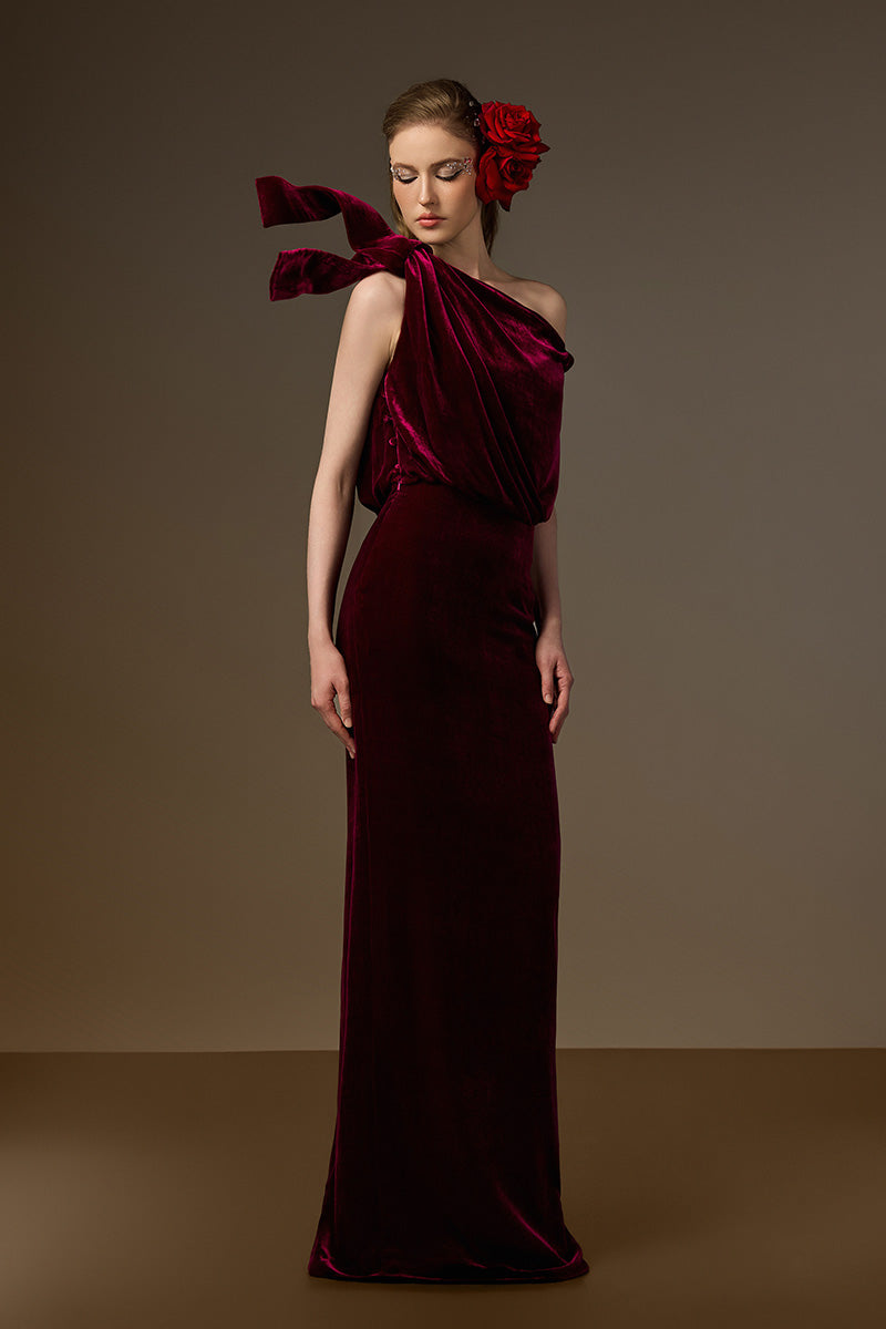 Dark pink velvet one-shoulder column gown with flowing drape detail by I.H.F, featuring an asymmetric design.