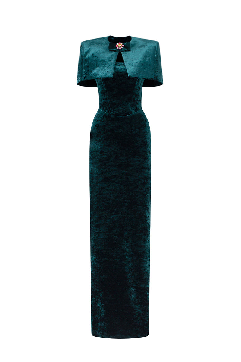 Green strapless column gown with a mini cape in grain velvet by I.H.F, featuring a sleek silhouette and elegant design.