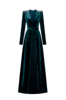 Green V-neck A-line gown with long sleeves in grain velvet by I.H.F, featuring a fitted waist and elegant flowing skirt.