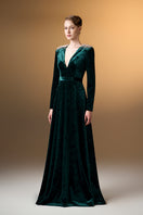 Green V-neck A-line gown with long sleeves in grain velvet by I.H.F, featuring a sleek and elegant design.