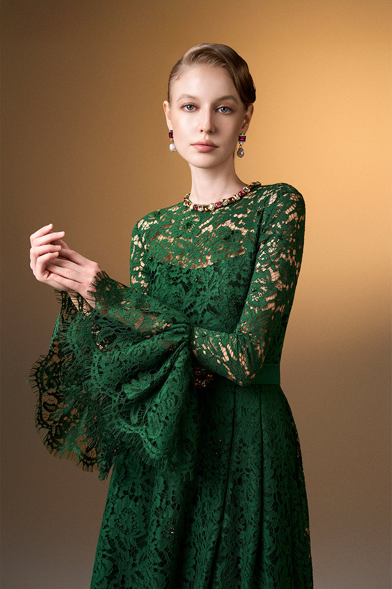 Green round neck A-line gown with ruffle long sleeves in French lace by I.H.F, showcasing elegant design and intricate lace details.