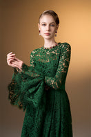 Green round neck A-line gown with ruffle long sleeves in French lace by I.H.F, showcasing elegant design and intricate lace details.