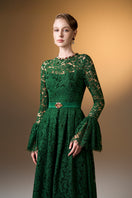 Green round neck A-line gown with ruffles and long lace sleeves by I.H.F, featuring elegant French lace details.