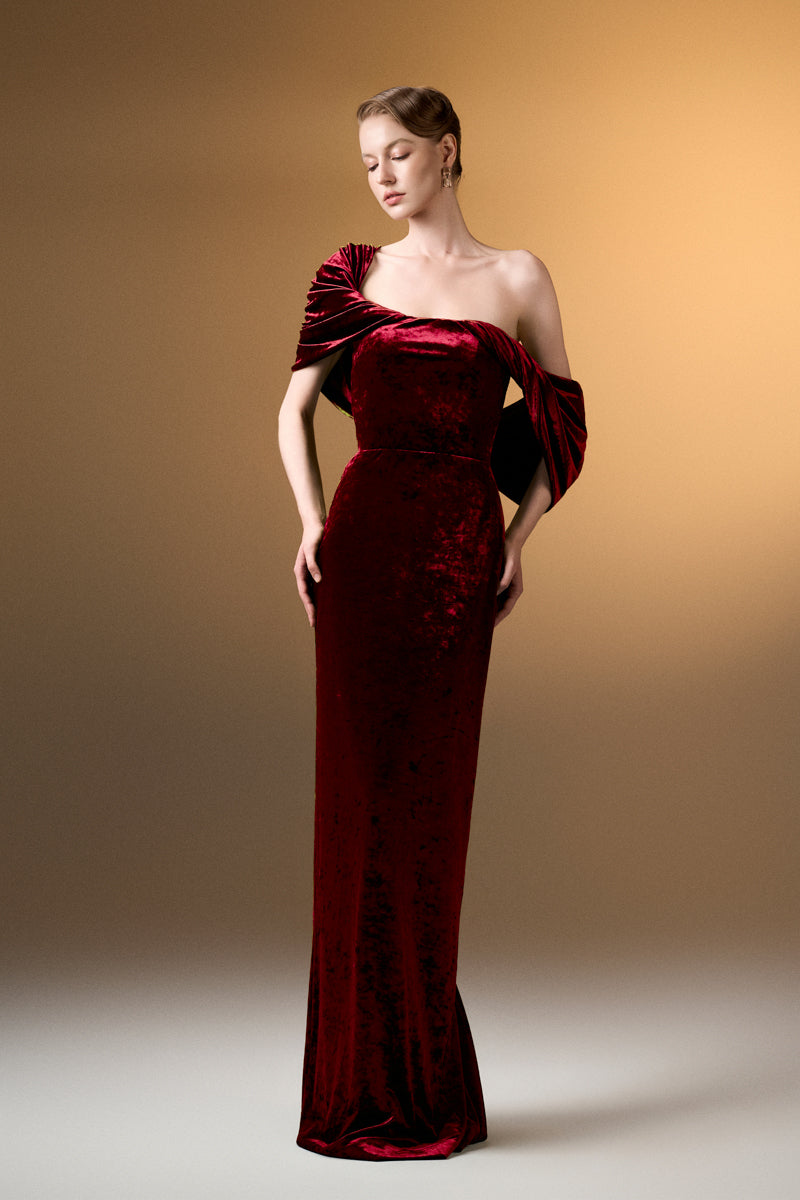 Dark red strapless column gown with pleated sleeves in grain velvet by I.H.F, shown on a model.