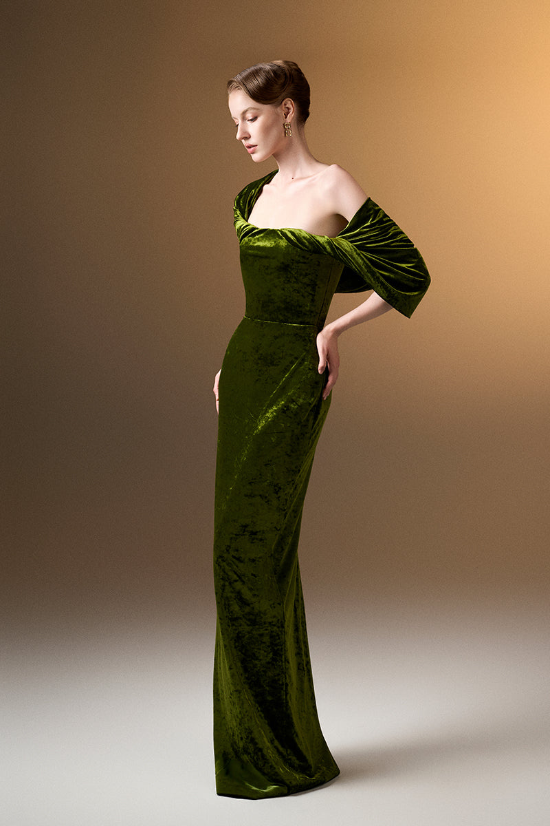 Light green strapless gown with pleated sleeves in grain velvet by I.H.F, featuring a sleek column silhouette.