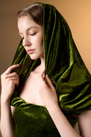 Light green strapless column gown with pleated sleeves in grain velvet by I.H.F, showcasing elegant drape and luxurious fabric.