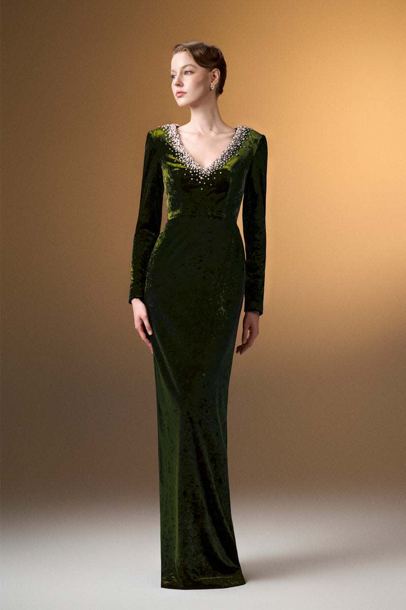 Green V-neck column gown with long sleeves in grain velvet by I.H.F, showcasing a sleek, elegant silhouette.