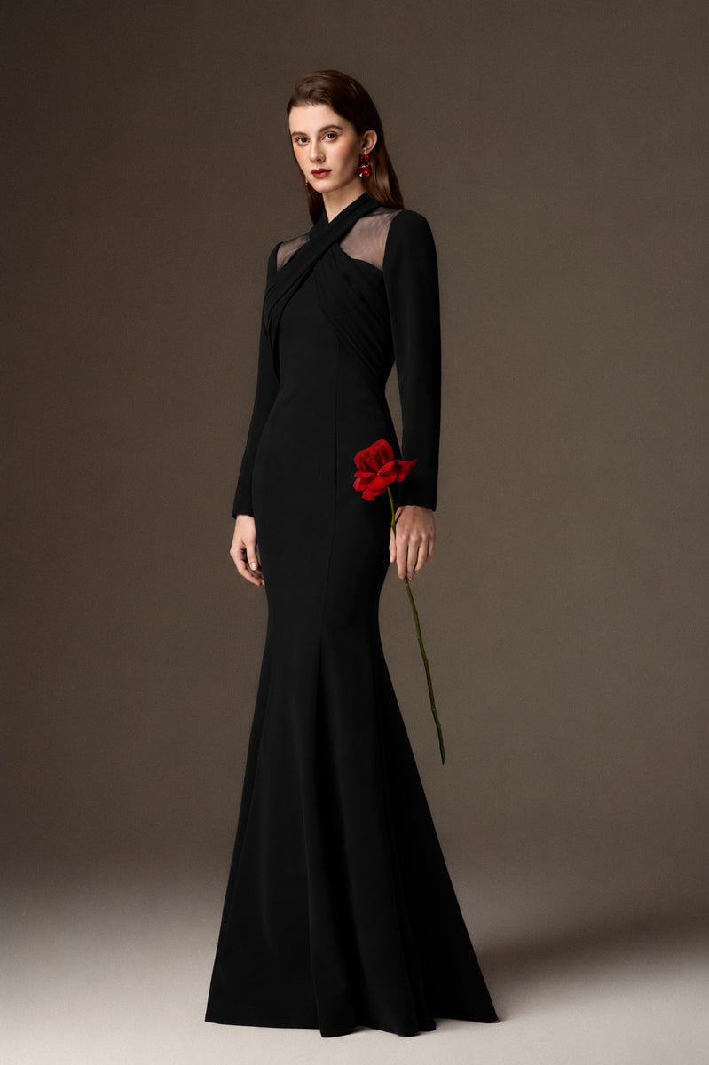 Black crepe mermaid gown with draped details and round neckline from I.H.F, showcasing elegant fit and flowing design.