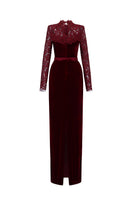 Dark red velvet gown with long sleeves and French lace detailing by I.H.F, showcasing elegant craftsmanship and luxurious fabric.