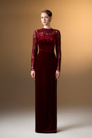 Dark red velvet column gown with long sleeves and French lace detail by I.H.F, shown on a model.