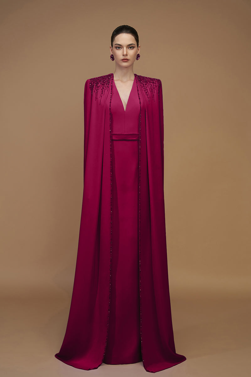 Elegant crepe and silk taffeta cape lipstick gown by I.H.F, featuring flowing fabric and stylish design for formal occasions.