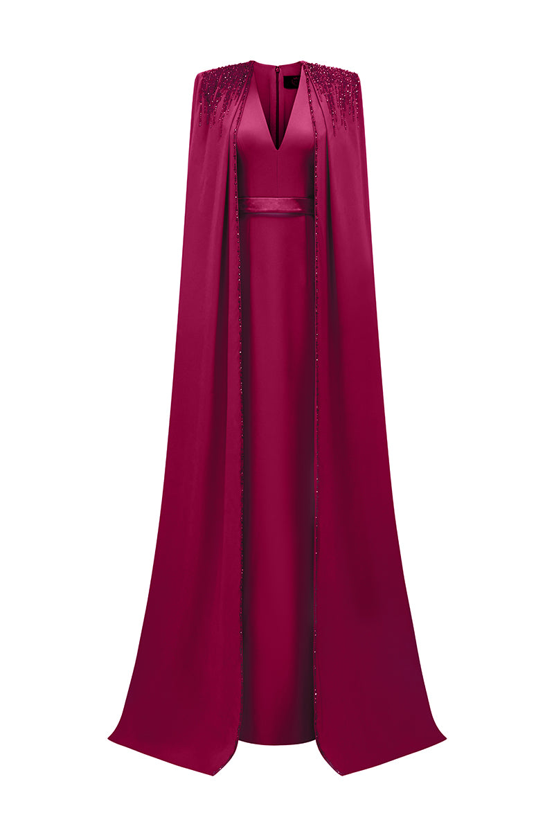 Elegant crepe and silk taffeta cape lipstick gown by I.H.F featuring a flowing silhouette and luxurious fabric details.