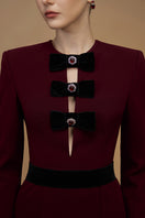 Elegant crepe de chine and velvet wine gown by I.H.F, featuring a flowing silhouette and luxurious fabric details.