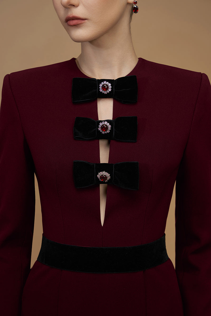Elegant crepe de chine and velvet wine gown by I.H.F, featuring a flowing silhouette and luxurious fabric details.