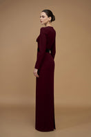 Elegant crepe de chine and velvet wine gown by I.H.F, featuring flowing fabric and luxurious design for formal occasions.