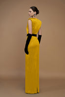 Elegant yellow silk gown with black stripes from I.H.F, featuring a flowing, luxurious design perfect for formal occasions.