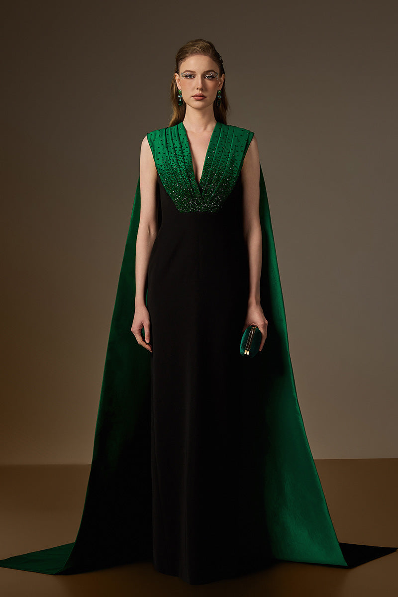 I.H.F green and black draped crepe and taffeta gown with a V-neck and elegant draped details, perfect for formal occasions.