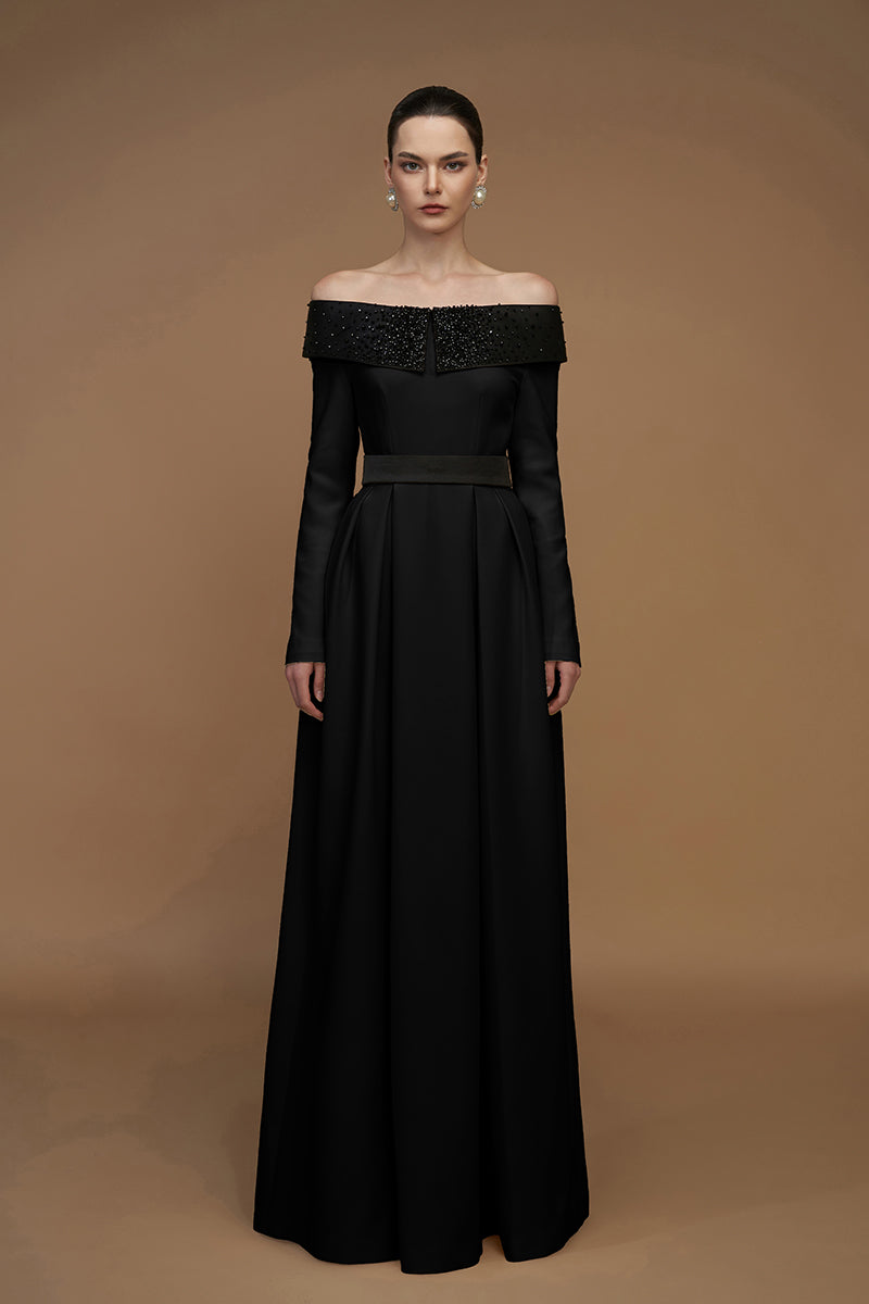 Elegant crepe de chine and silk taffeta gown by I.H.F, featuring flowing fabric and intricate design details.