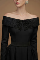 Elegant crepe de chine and silk taffeta gown by I.H.F, featuring a flowing silhouette and intricate detailing.