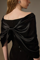 Black ELODIE I.H.F draped V-neck column gown in crepe and satin silk, showcased with elegant draped details.
