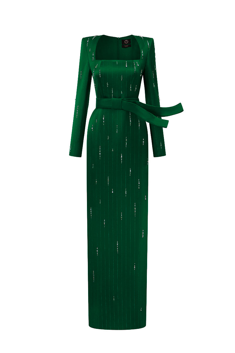 Dark green metallic belted train column gown by I.H.F featuring a trapeze neckline and flowing silk train.