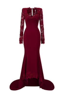Elegant burgundy mermaid gown with trapeze neck and floral garden mesh lace, designed by I.H.F, featuring mullet details and crepe fabric.