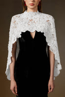 Black and white V-neck caped gown by I.H.F featuring velvet fabric and floral garden mesh lace detailing.