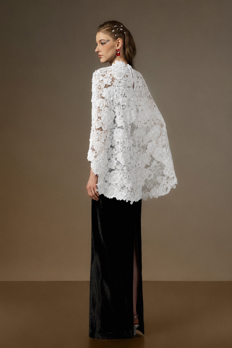 Black and white V-neck caped gown by I.H.F featuring velvet fabric and floral garden mesh lace detailing.