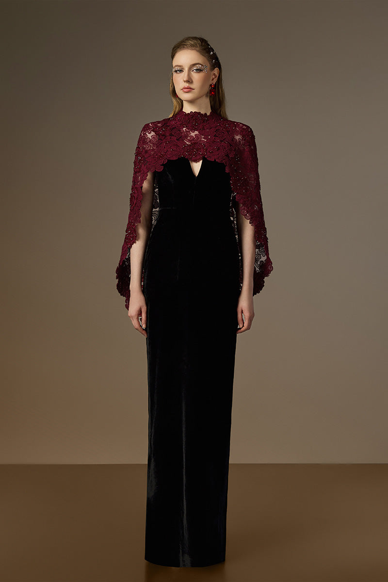 Elegant black and burgundy V-neck caped column gown by I.H.F featuring velvet fabric and red floral garden mesh lace.