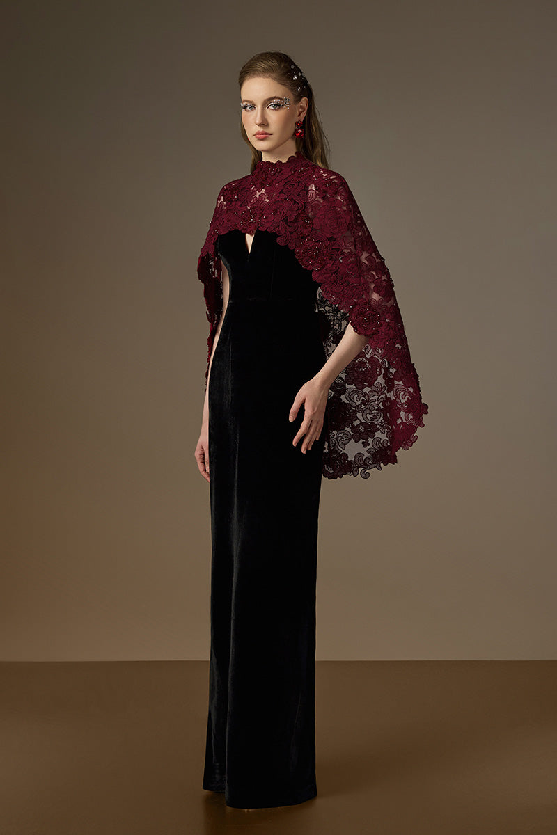 Black and burgundy V-neck caped column gown by I.H.F featuring velvet fabric and floral mesh lace detailing.