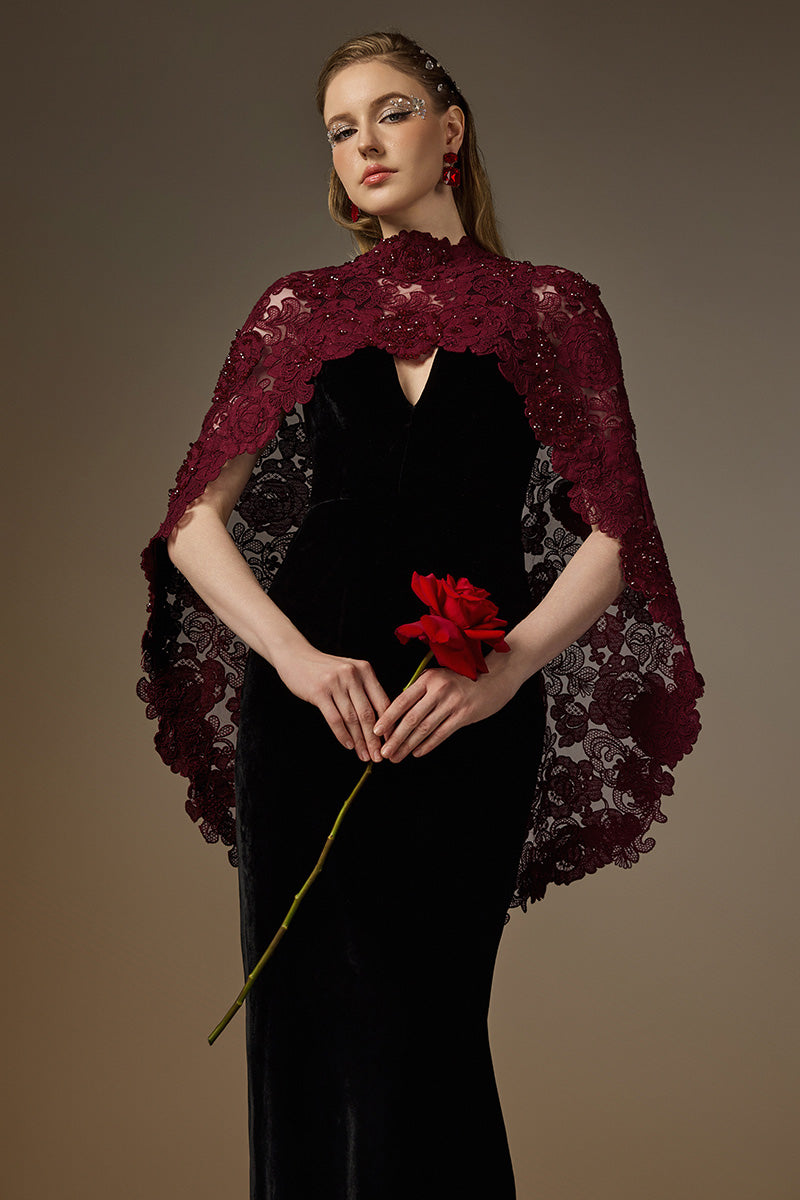 Black and burgundy V-neck caped gown with floral mesh lace from I.H.F, featuring a velvet fabric and elegant mullet cape design.
