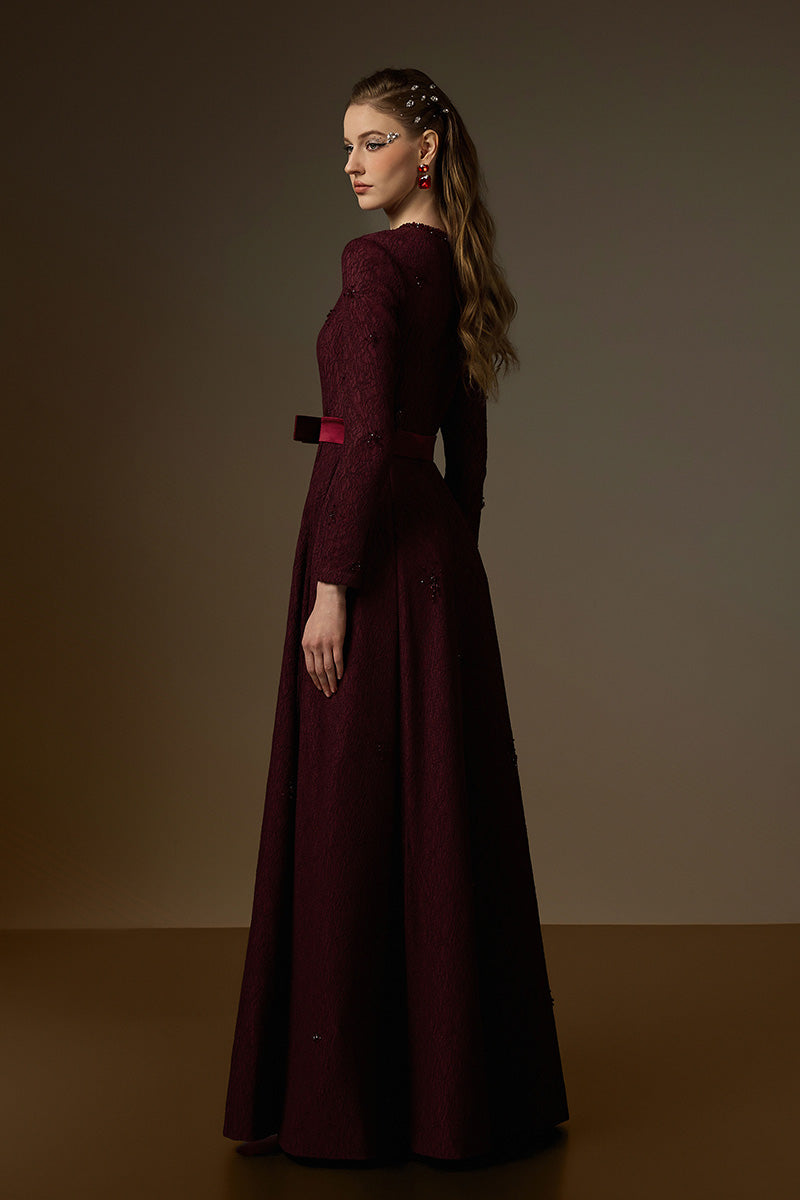 Beatrix burgundy crystal embellished guipure lace A-line gown by I.H.F featuring a round neckline and intricate lace design.