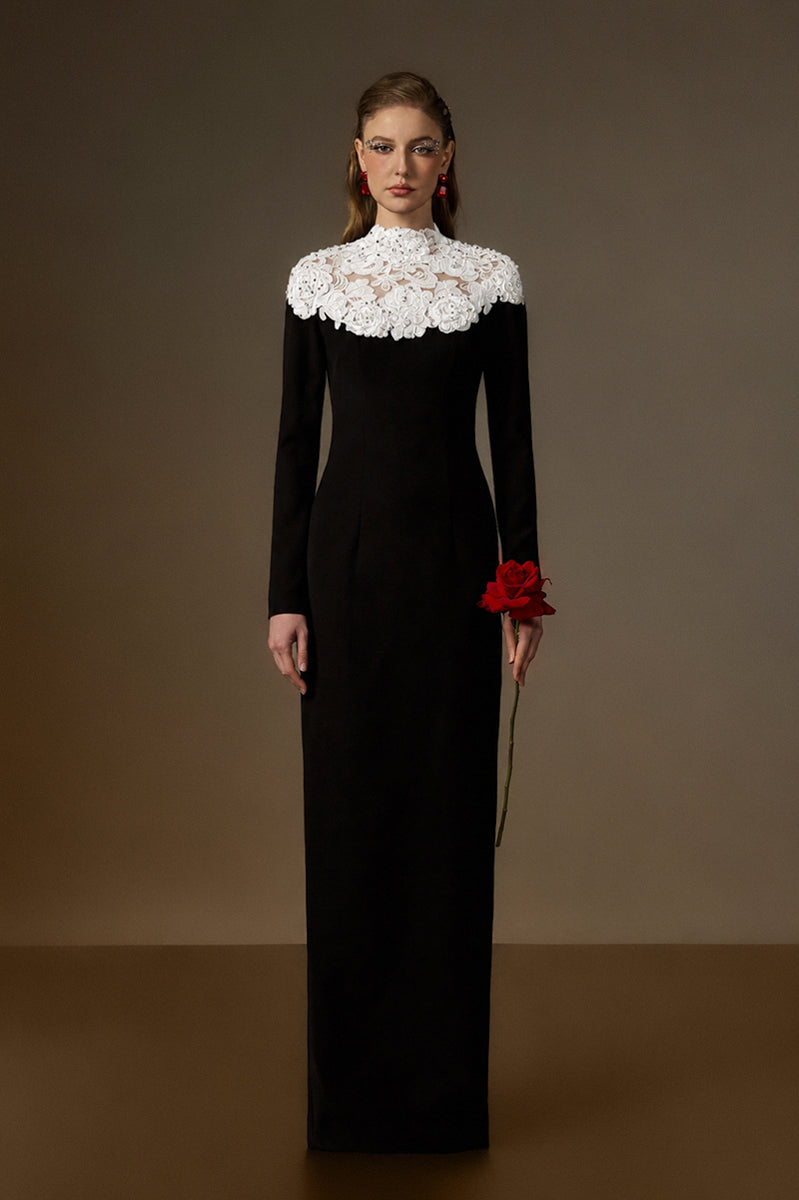 Black and white lace column gown by I.H.F with round neck and red crystal embellishments, featuring intricate floral lace details.