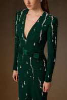 Dark green I.H.F Seraphina gown with V-neck, embellished water effect, and flowing crepe fabric, form-fitting column style.