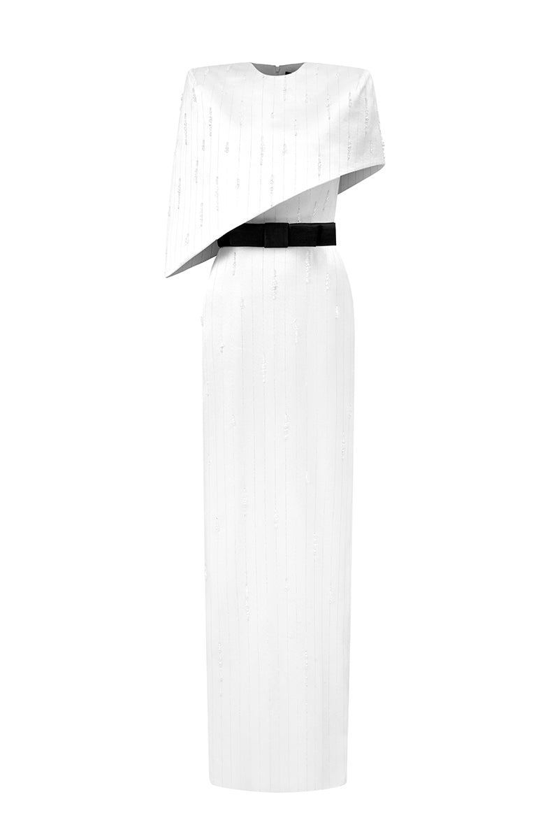 White metallic asymmetric cape gown by I.H.F featuring a round neck and elegant silk fabric, perfect for formal occasions.